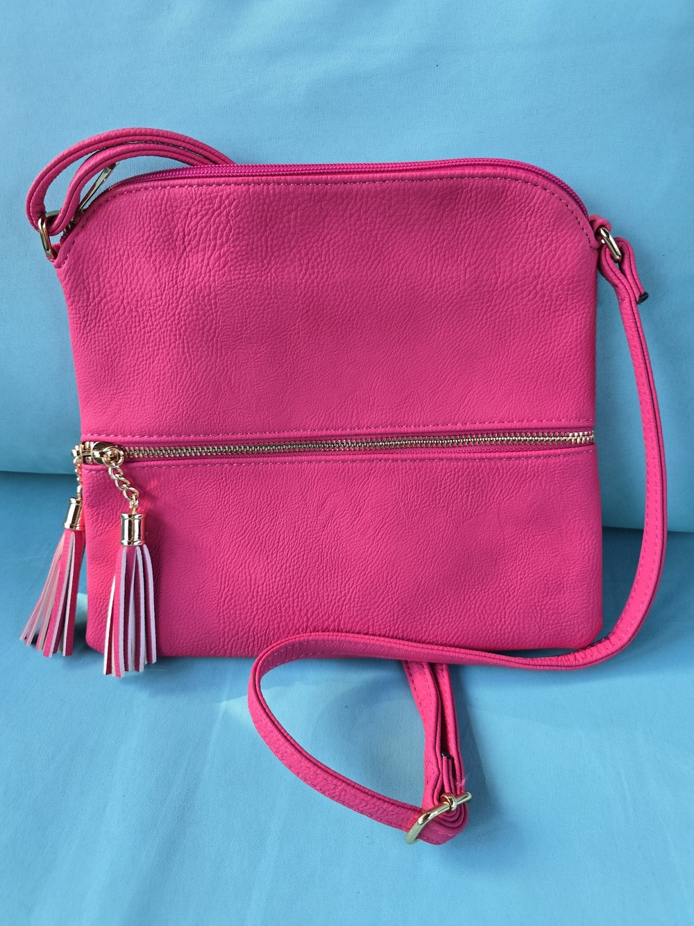 Bright Pink Crossbody Bag with Tassel Accent